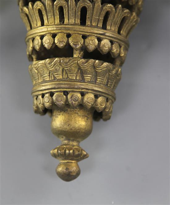 A Sino-Tibetan bronze model of the Buddhist emblem of a parasol, width 34.5cm